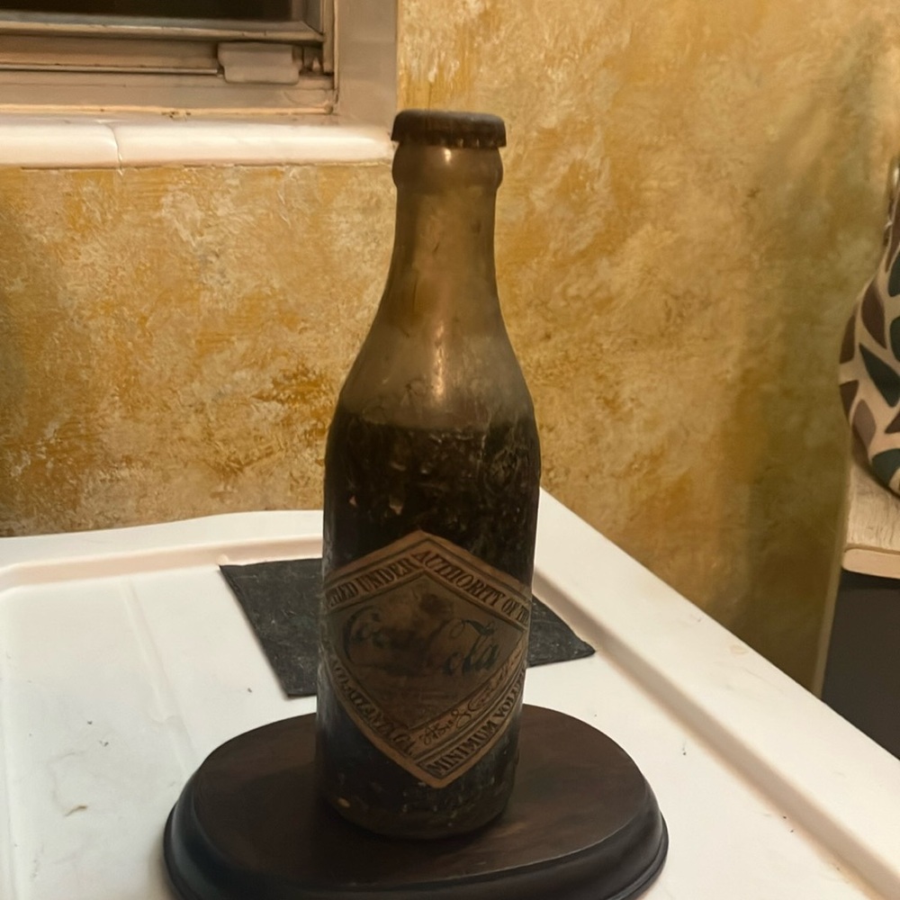 Unopened antique coke bottle old straight body type